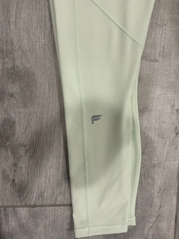 Fabletics Define PowerHold High-Waisted 7/8 Legging in Neo Lime  - Image 7
