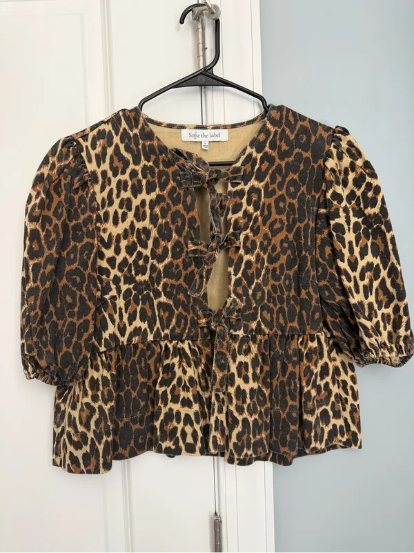 Leopard-Print Tie-Front Peplum Blouse in Tan & Black - Image 3