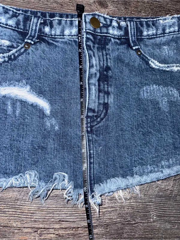 Free People distressed denim mini skirt with a frayed raw hem - Image 3
