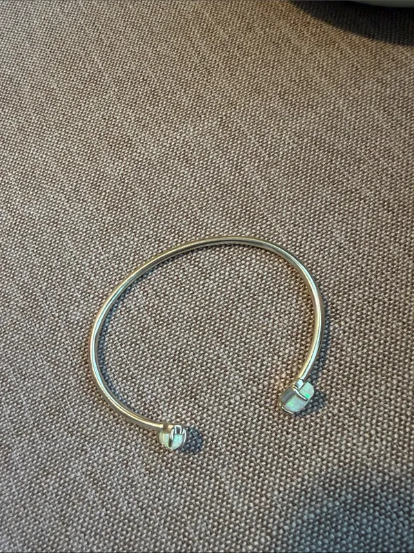 Kendra Scott gold Open Cuff with White Opal Ends - Image 3