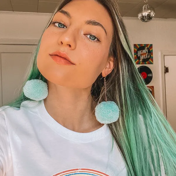 Light Teal Blue Pom Pom Earrings - Image 3