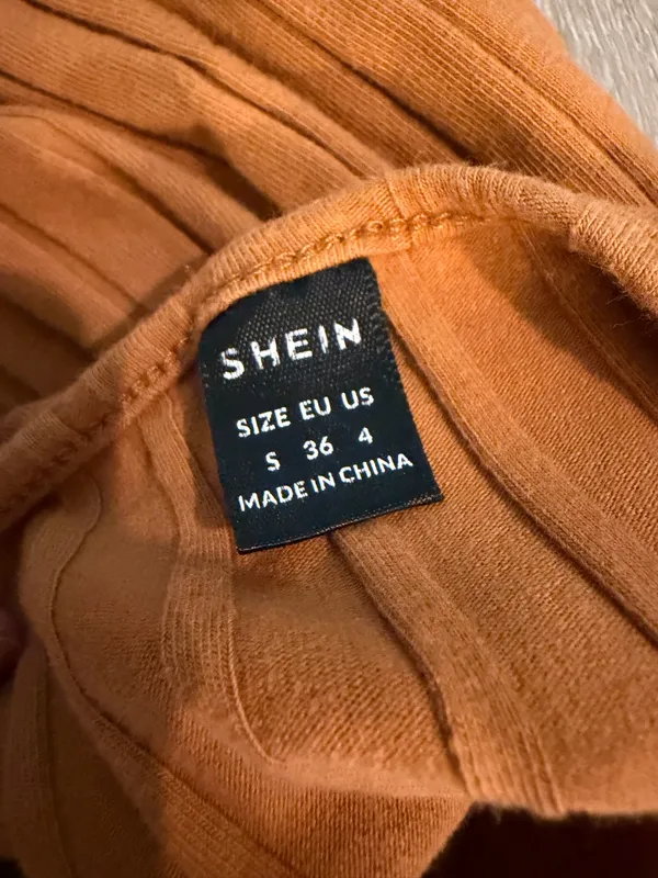 SHEIN Ribbed Cami Mini Dress – Size Small – Like New This camel brown ribbed cami mini dress from SHEIN is in excellent, like-new condition with no visible marks, stains, or flaws. Brand: SHEIN Size: Women's Small (US 4 / EU 36) Condition: Like New / Flawless Features: Vertical ribbed knit texture, cami spaghetti straps, stretch fit, casual mini length Comfortable and versatile, it pairs perfectly with sandals, sneakers, or layered under a jacket or cardigan. Ships fast from a clean, smoke-free home! - Image 3
