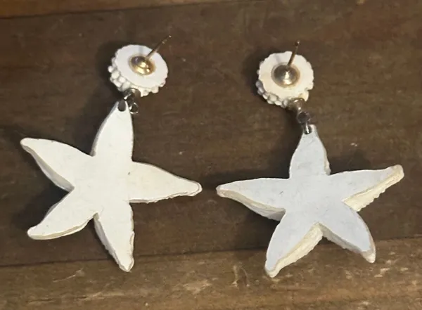 White resin starfish dangle post earrings - Image 4