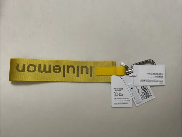Lululemon NWT Never Lost Keychain Maize Yellow Graphite Grey - Image 2