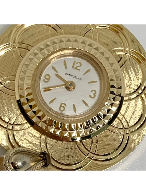 Vintage Caravelle by Bulova women Mechanical Pendant Watch gold tone 33mm works - Image 3