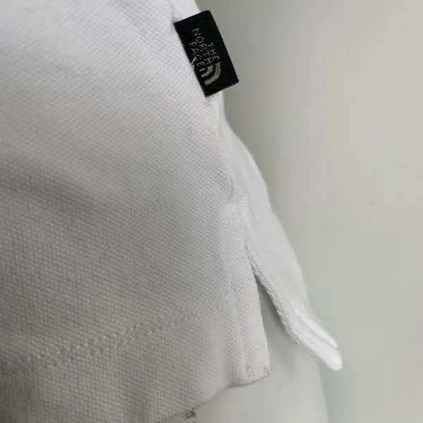 North Face A5 series white Women’s medium short sleeve polo shirt - Image 3