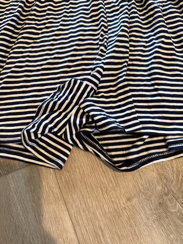 Urban Outfitters Striped Romper - Excellent Condition - Women’s Size M Description: Upgrade your casual wardrobe with this effortless Urban Outfitters striped knit romper! Made in the USA, this stylish piece features a classic navy and white nautical stripe pattern with a flattering deep V-neckline, soft cap sleeves, and a comfortable cinched elastic waistband. Crafted from a soft, lightweight stretch fabric, it’s perfect for summer outings, beach cover-ups, or casual weekend wear. Brand: Urban Outfitters Size: Women’s Medium (M) Condition: Excellent, like-new condition with no visible flaws, stains, or excessive wear. Details: Elasticized waist, short inseam, breathable stretch material, made in USA. Fast shipping from a smoke-free home! Feel free to drop a comment with any questions or send reasonable offers. - Image 3