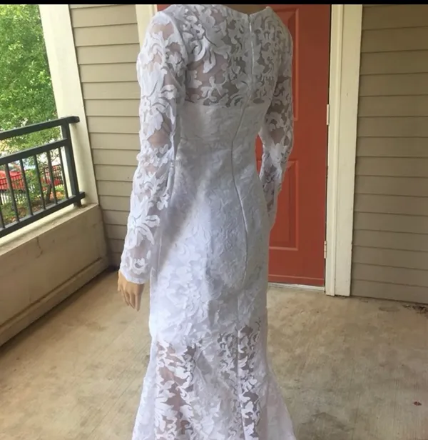 White Lace Long-Sleeve Bridal Gown with V-Neck and Front Slit - Image 4