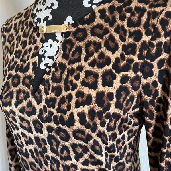 Michael Kors stretchy leopard pullover top w gold logo clasp NWOT - Image 4