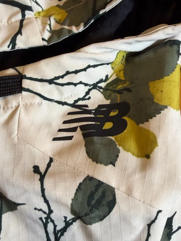 New Balance Cream Floral-Print Wind Breaker Jacket with Black Sleeve Panels - Image 6