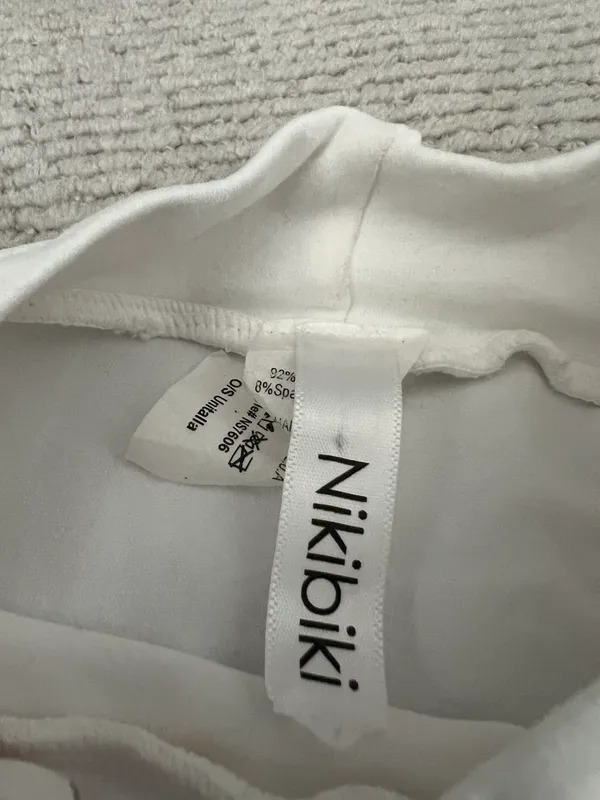 NIKIBIKI Women Seamless Long Sleeve Mock Neck Crop Top - Image 4