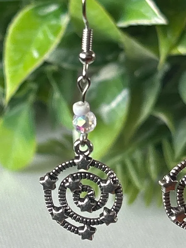 Handmade Silver Star Spiral Drop Earrings with White Bead Accent - Image 2