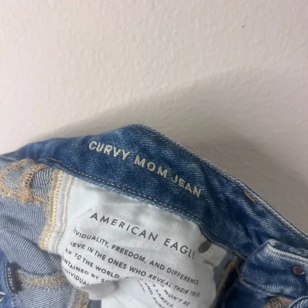 American Eagle Outfitters Distressed High-Rise Blue Jeans - Image 7