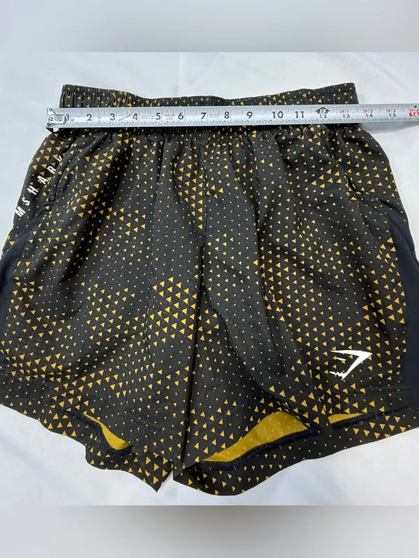 Gymshark Black Shorts with Gold Triangle Print - Image 6