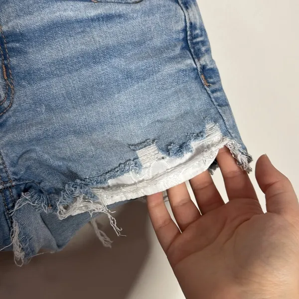 American Eagle light wash distressed High-rise Jean Shorties denim shorts size 0 - Image 5