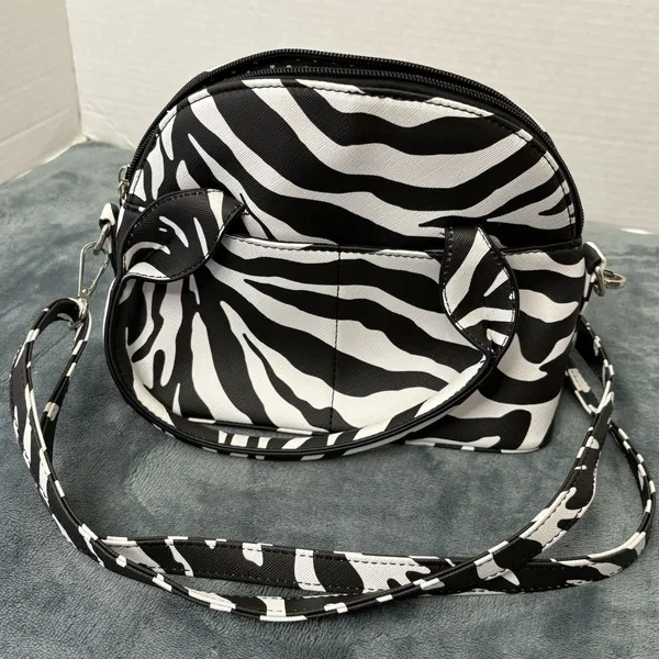 Olivia & Kate Zebra Striped Dumpling Bag - Image 6