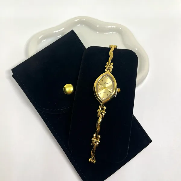 Dainty Gold Tone Bow Watch - Image 3