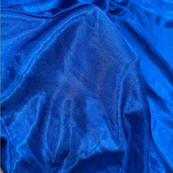Lati Fashion…Vibrant Blue Women's Blouse with Floral Detail - Image 7