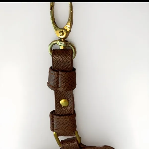 Adrienne Vittadini Brown luggage tag ID holder brown leather gold tone Logo - Image 6