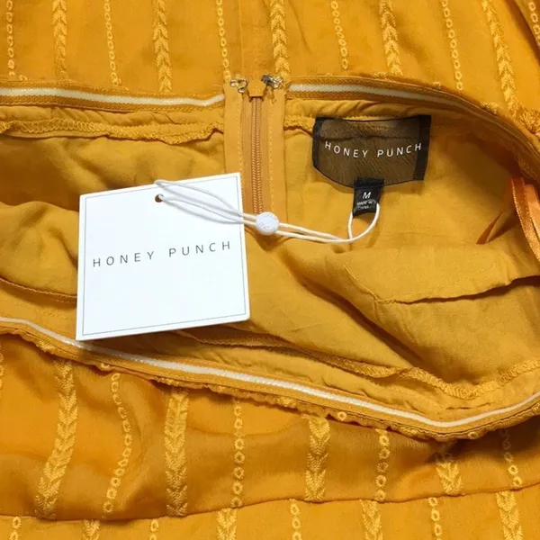 Honey punch gold strapless mini dress with tassels. New with tags - Image 9