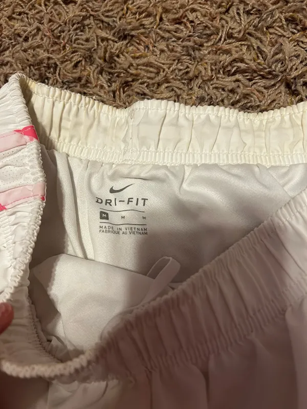 White and pink Nike dri fit shorts - Image 2