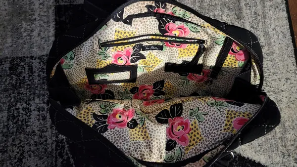Vera Bradley black diagonal zippered stitch black briefcase/overnight bag with removable laptop sleeve. Bag..15.5" x 11" x 3".. laptop sleeve with velcro closure tab. 14.5" x 10.5" x 2" - Image 3