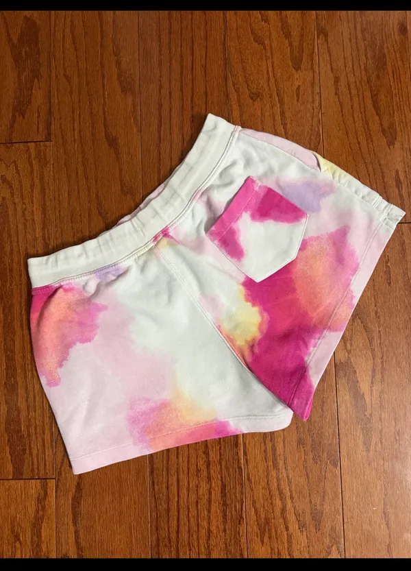 Champions Tie-dye Fleece Drawstring pull-on Shorts- size Medium. Gently warn & Excellent condition. Pockets on each side & 1 back pocket. Non-smoking home. Priced to sell at as is condition. Measurements approximately 13” waste not fully stretched out x 11” long. Don’t like my price make a reasonable offer. - Image 2