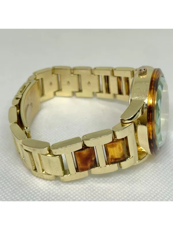 Gold tone tortoiseshell style women watch 38mm quartz analog up to 7.5” running - Image 8
