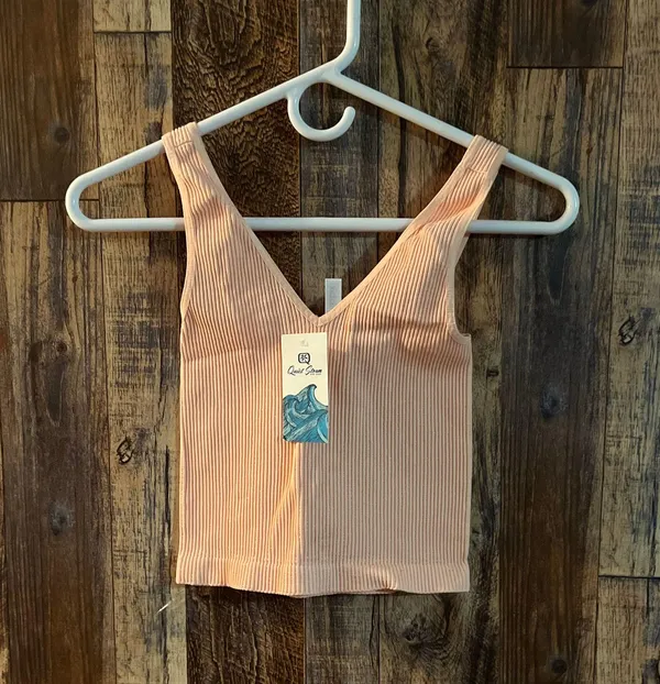 NIKIBIKI Women Seamless Plunge V-Neck Ribbed Crop Top, Made in U.S.A, One Size Elevate your style with this chic peach ribbed V-neck top. Perfect for any occasion. - Image 2