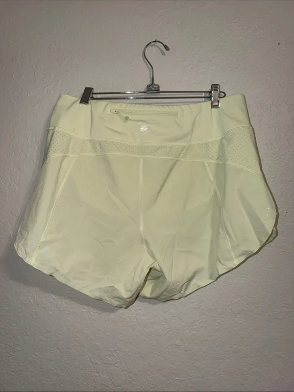 Athleta run with it shorts pastel lime green - Image 2