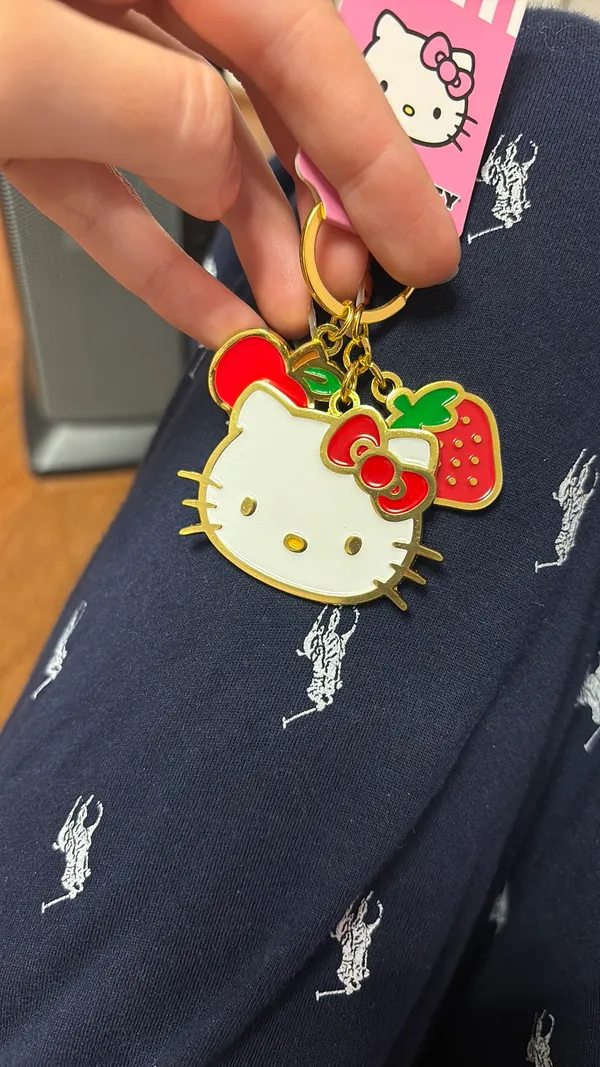 Hello Kitty NWT Sanrio  Fruit Keychain gold tone - Image 3