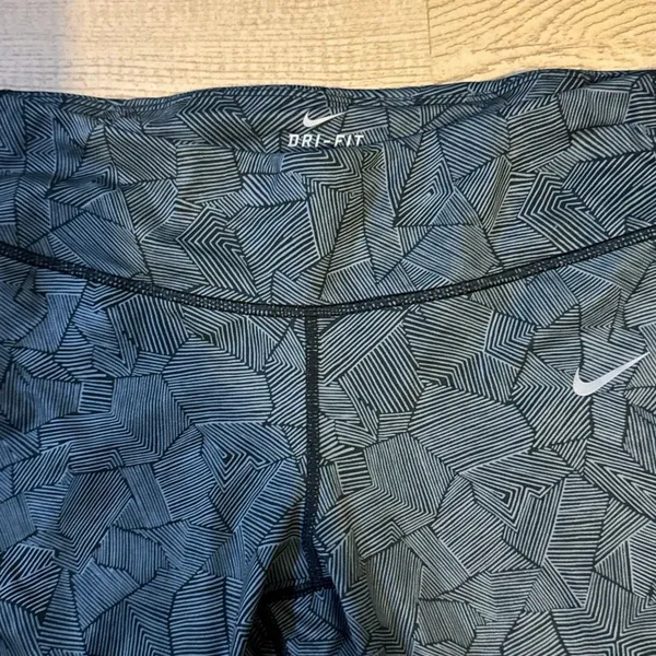 Nike Dri-FIT Capri running leggings with a black and gray geometric print and me - Image 2