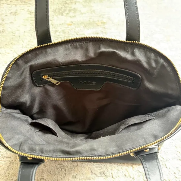 faux leather black Bebe shoulder bag with gold hardware and stud accents - Image 3