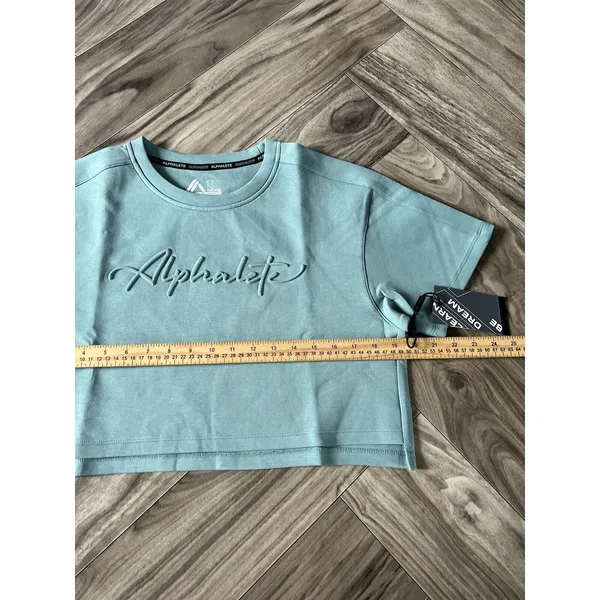 Alphalete Woman’s ELMTS Short SLEEVE Crop - Teal , Size XS - Image 4