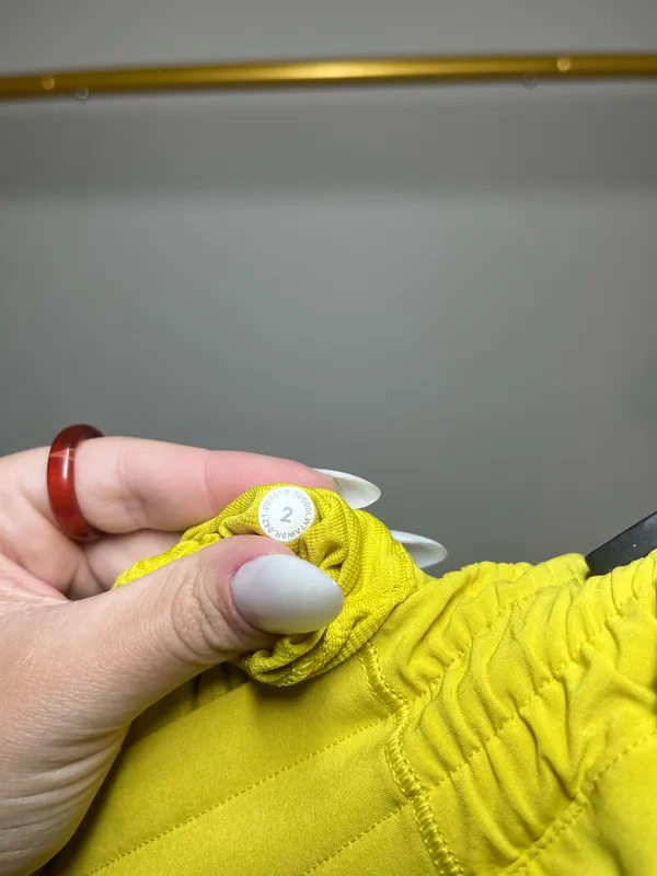 Lululemon yellow shorts with white reflective stripes #activewear #athletic - Image 4