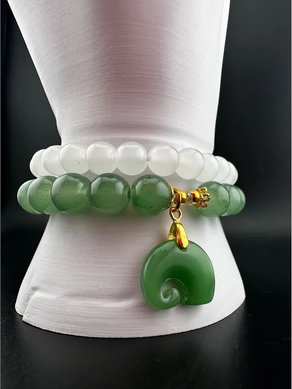 Set of Two Green and White Beaded Bracelets with Green Charm - Image 3