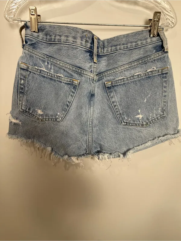AGOLDE Light Wash Distressed Denim Cutoff Shorts - Image 6