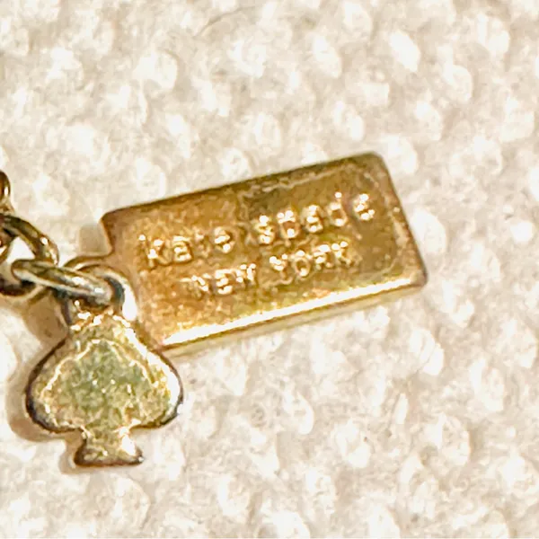 Kate Spade New York Gold Tone Clear Crystal Station Necklace Emerald & Round Cut - Image 7