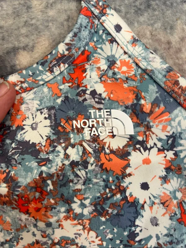 The North Face Women's Floral Racerback sports bra in Blue and Orange size M. - Image 2