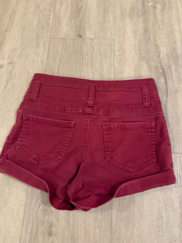 Mossimo Supply Co. Women’s High-Waisted Red Shorts – Like New, Size 00 Upgrade your summer wardrobe with these stylish Mossimo Supply Co. high-waisted shorts in a vibrant red/burgundy shade. Condition: Like new, excellent condition with no marks, stains, or flaws. Brand: Mossimo Supply Co. Size: Women's 00 / 24 Details: High-waisted silhouette, trendy multi-button closure, cuffed hems, 5-pocket styling, and durable belt loops. Material: 60% Cotton, 38% Polyester, 2% Spandex for a soft, comfortable fit with just the right amount of stretch. Fast shipping! Feel free to reach out with any questions. - Image 2