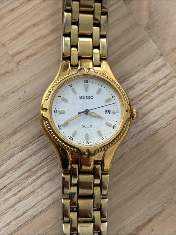 Seiko Vintage Watch Gold Bracelet Case White Dial Blue Gold Hands Date Window - Image 3