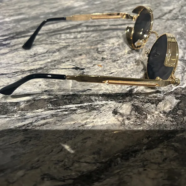 Round Gold and Black Sunglasses - Image 9