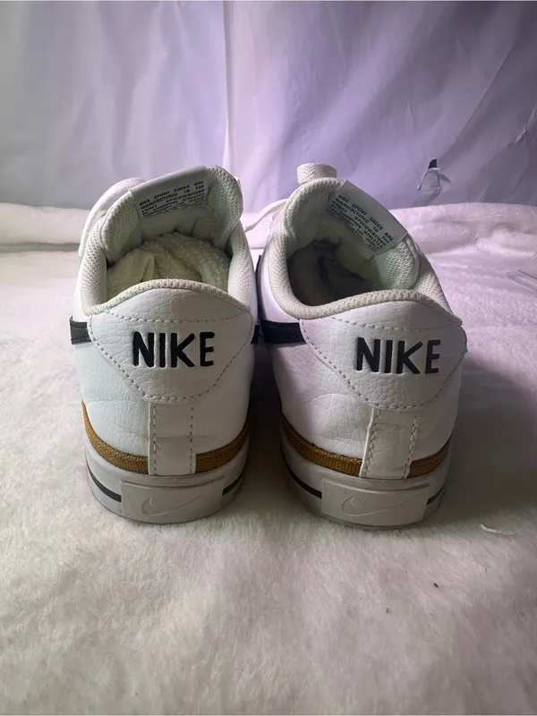 Nike White Sneakers with Black Swoosh and Orange Accent - Image 9