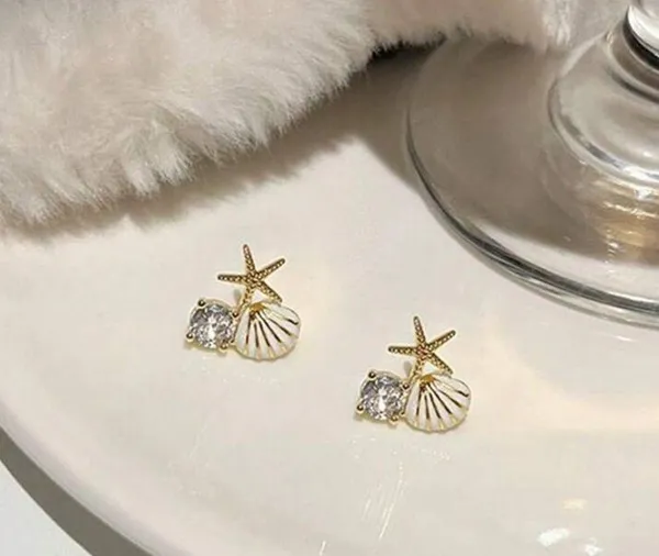 Gold and White Starfish Shell Earrings - Image 4