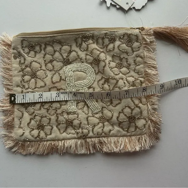 Elegant Floral Beige Clutch with Fringe Anthropologie - Image 5