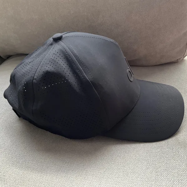 Alo Yoga Performance District Trucker Hat Black - Image 3