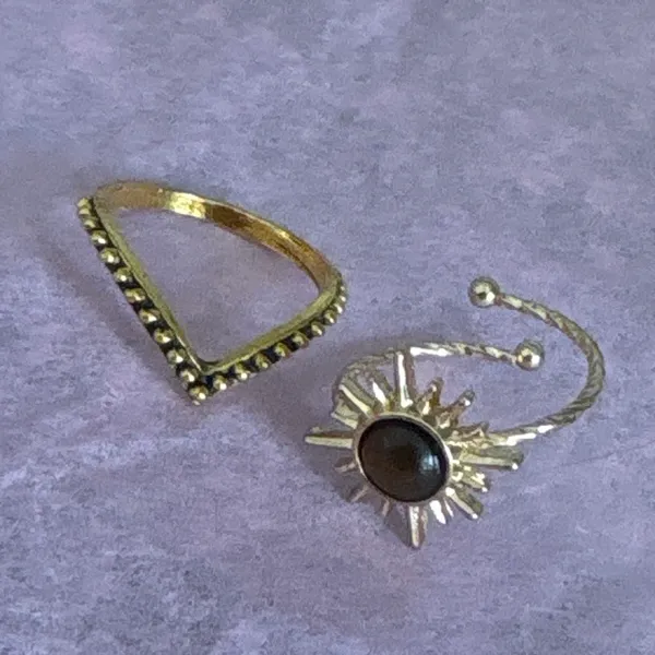 Two rings. One is adjustable, one is about a size 7.5 Gold - Image 2