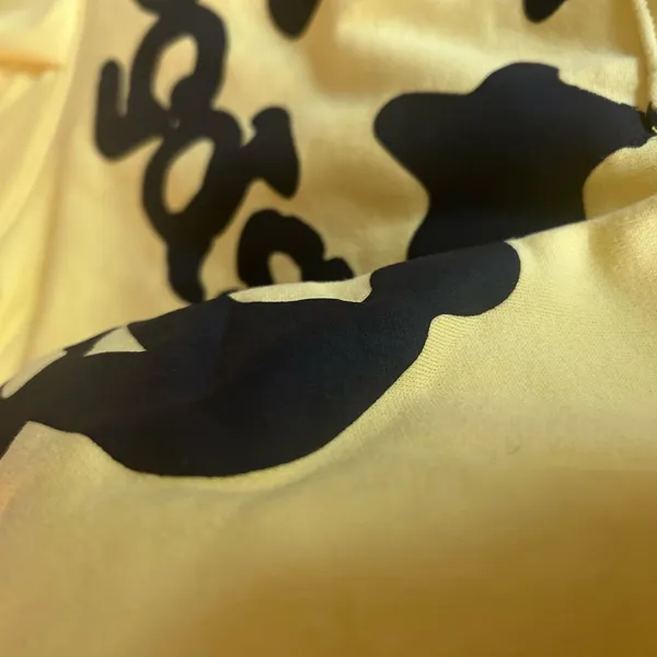 Spyder hoodie size small yellow star - Image 4