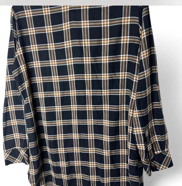 Classic Sanctuary navy plaid tunic-style button front shirt featuring a relaxed fit, chest pockets, and roll-tab sleeves for versatile styling. Lightweight and easy to wear with leggings, denim, or layered over a tank. Great casual staple for fall and transitional seasons - Image 3