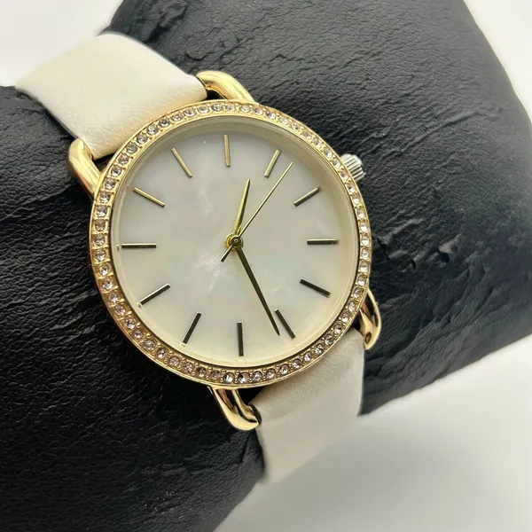 Women’s Gold-tone Crystal Bezel Mother Pearl Dial White Band Minimalist Watch - Image 3